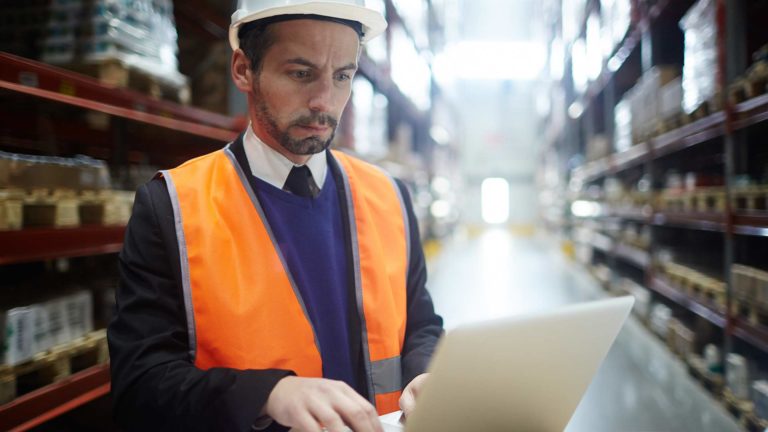 A factory supervisor manages his vast inventory.